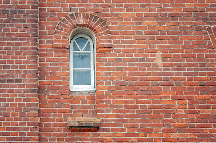 Window on the facade of an old house, an Architecture Photo by Schreibikus