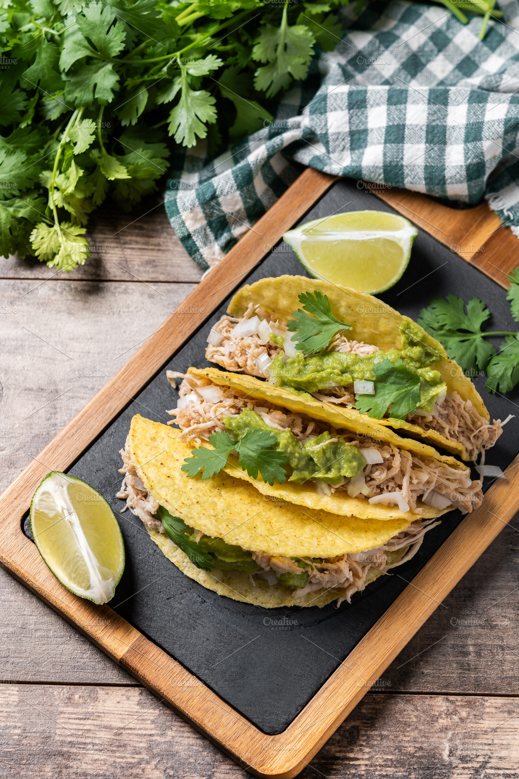 Mexican chicken tacos with guacamole and cilantro, a Food & Drink Photo by etorres69