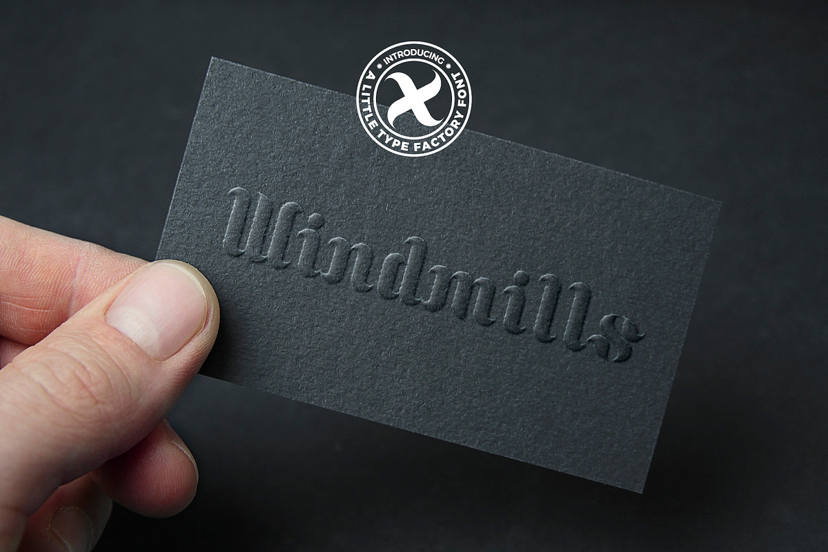 Windmills - ornate swirling serif font preview 6