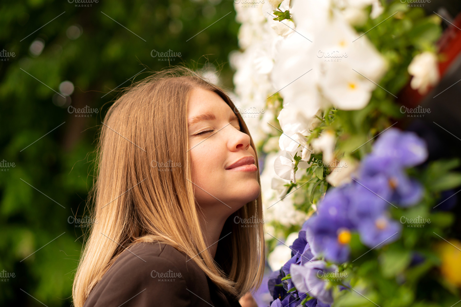 Young woman outdoors happily enjoyin, a Person Photo by Elena Vagengeim