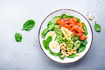 Ketogenic salad with salted salmon, avocado, spinach, cucumber,, a Food & Drink Photo by 5PH