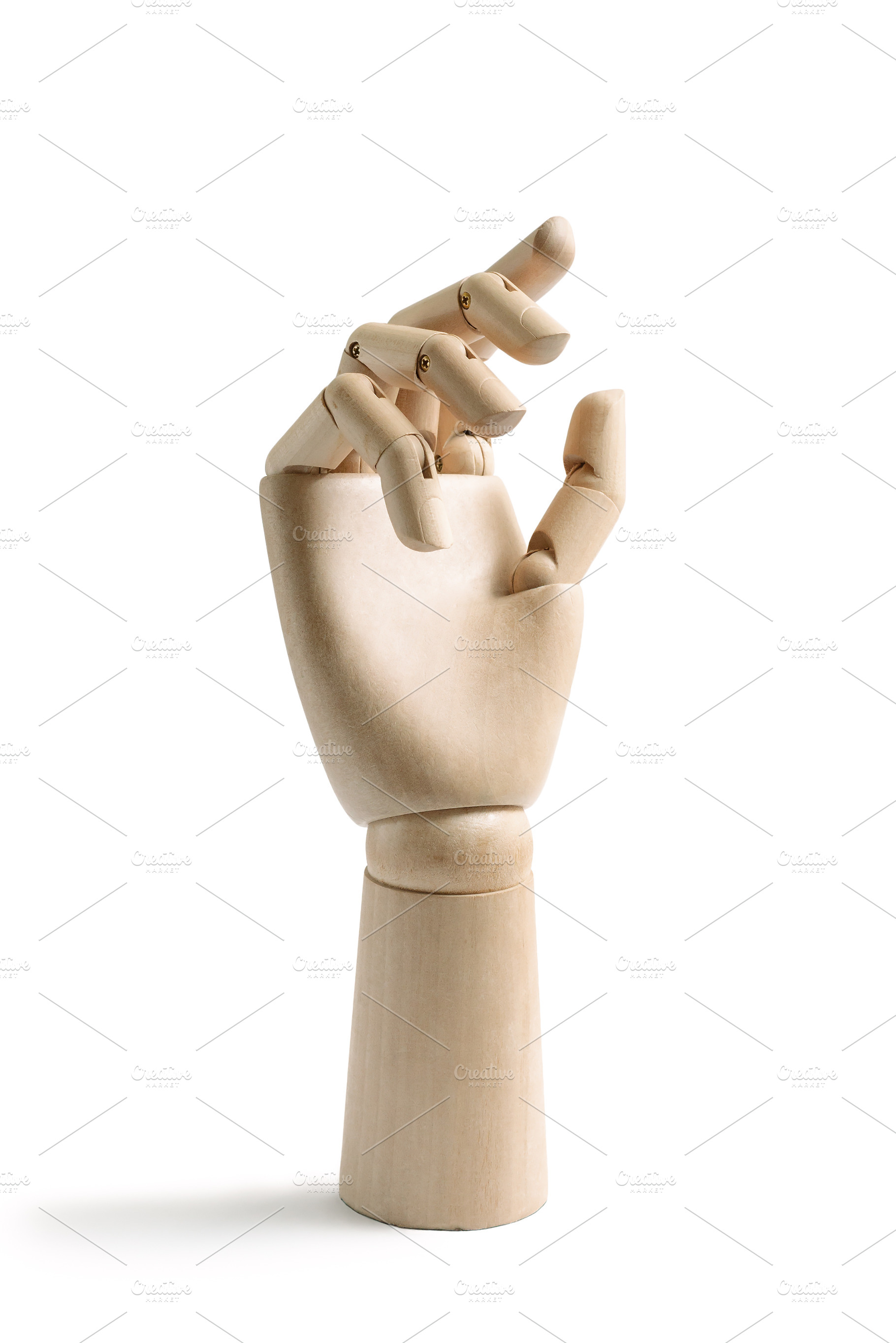 One wooden hand isolated on a white, an Abstract Photo by Etienne & Yolandi Outram