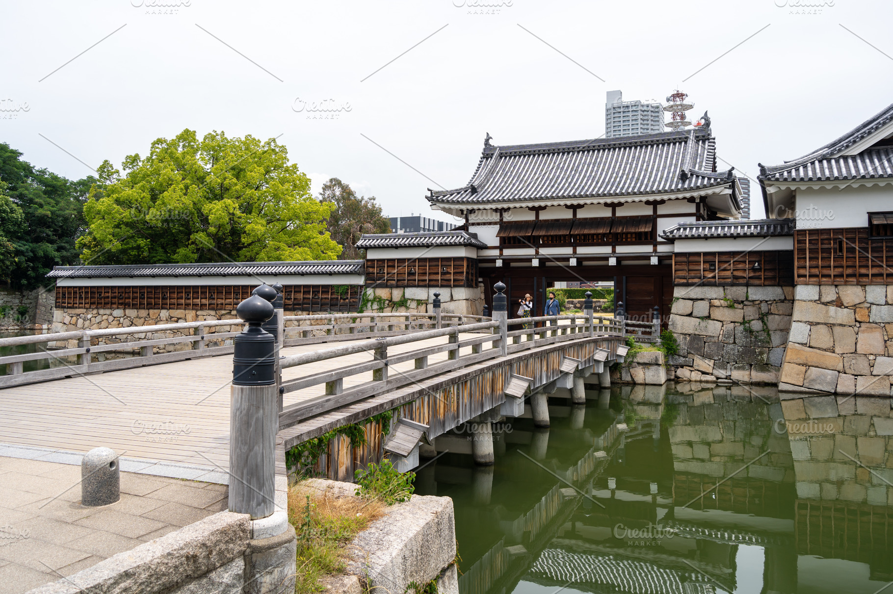 Traditional architecture of Hiroshima Castle and moat in Japan, an Architecture Photo by GoodGoods