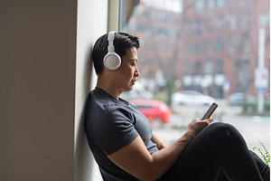 Hygge moment for young man sitting, a Person Photo by HalfPoint