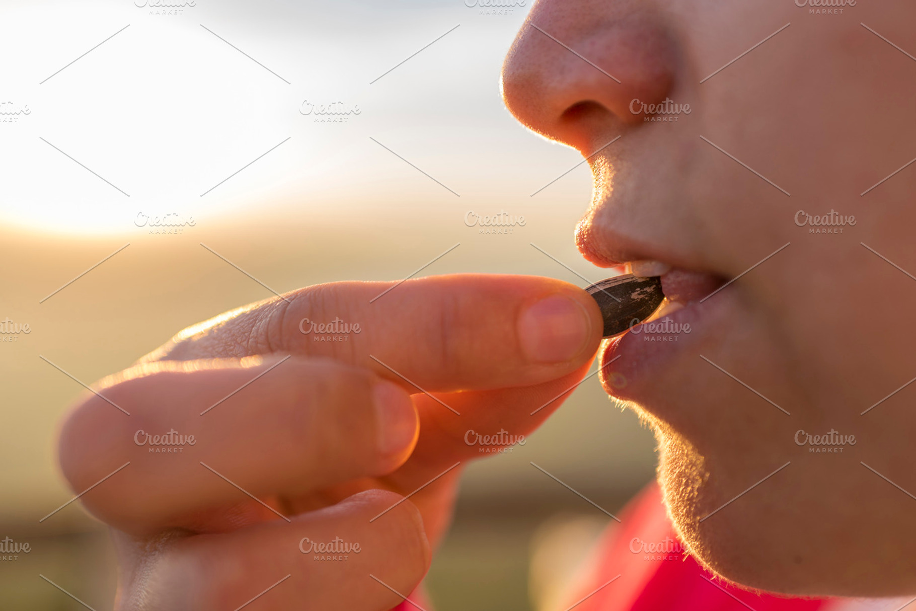 Sunflower seeds featuring bite, biting, and calories, a Food & Drink Photo by Josfor photos