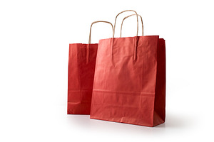 Two empty red paper shopping bag cut out white, a Holiday Photo by Davizro's Market