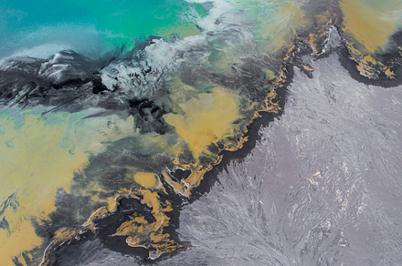 Aerial industrial photography stock photo containing fuel and coast