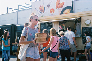 Girl at a food truck festival