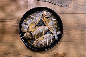 Juicy dorado fish are presented on a, a Food & Drink Photo by darksoul72