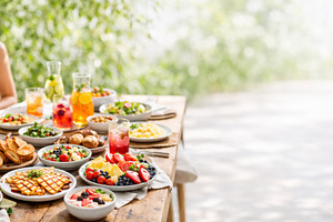 Outdoor backyard BBQ party food tabl, a Photo by Dvoevnore photos