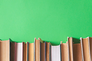 Old books on a green background