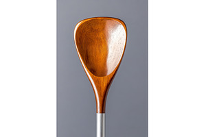 Close up of elegant wooden spoon, a Background Photo by Lermont51