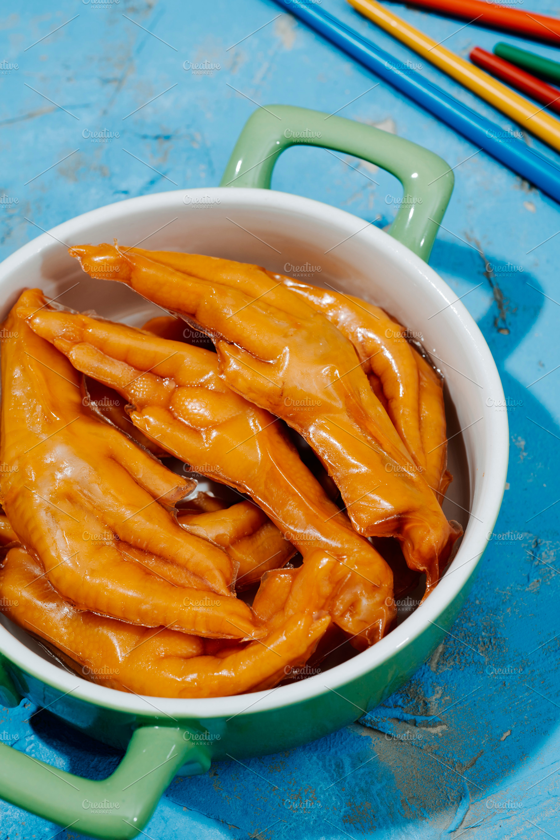 asian chicken feet coated in gelatin in a casserole, a Photo by Nito