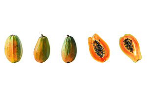 Whole and halved papayas, a Food & Drink Photo by piter.goskov