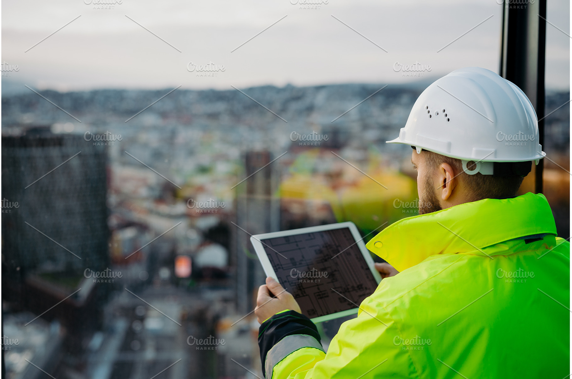 Rear view of construction site, an Industrial Photo by HalfPoint