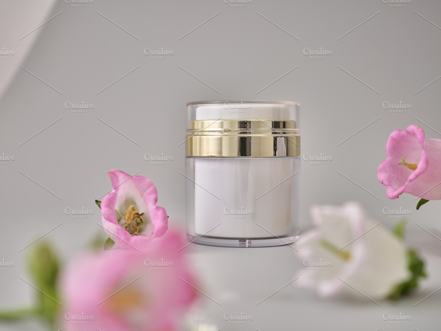 Skincare products on neutral background. Mockup bottles and flow, a Beauty & Fashion Photo by Asya Nurullina