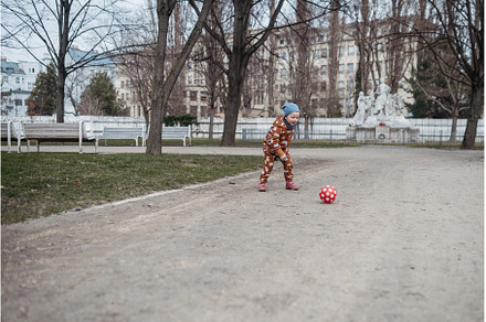 Cute toddler girl playing outdoor in, a Nature Photo by HalfPoint