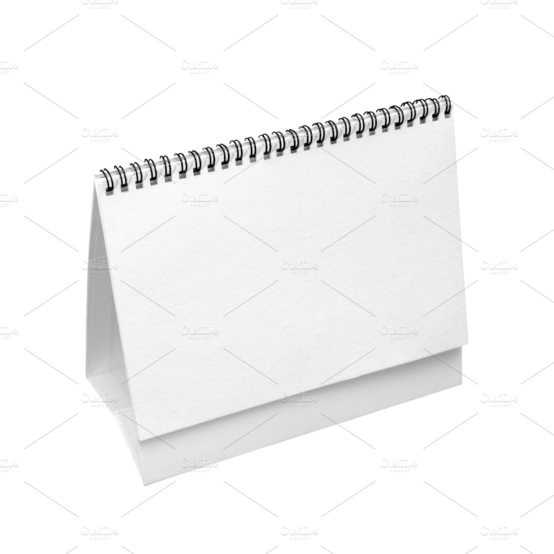 Blank paper desk calendar isolated, a Business Photo by BOOCYS