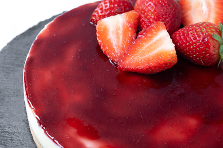 Cheesecake with strawberries isolated on white background, a Food & Drink Photo by etorres69