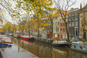 Autumn canals of Amsterdam with houseboats and Dutch houses, pan, a Photo by Pictures for you!!!!!!!!!