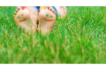 Children's feet with a pattern of, a Nature Photo by yanadjana
