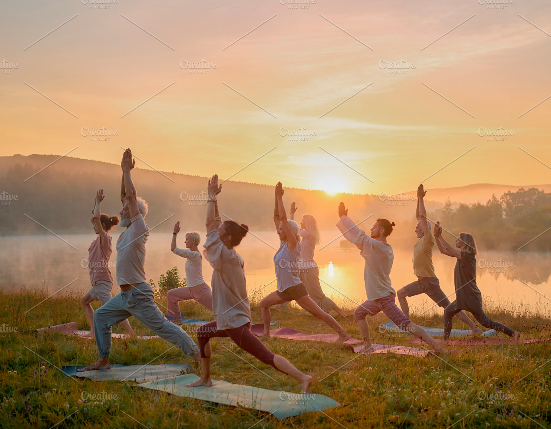 People practicing yoga in harmony at tranquil sunset landscape, a Health & Medical Photo by DanFLCreativo