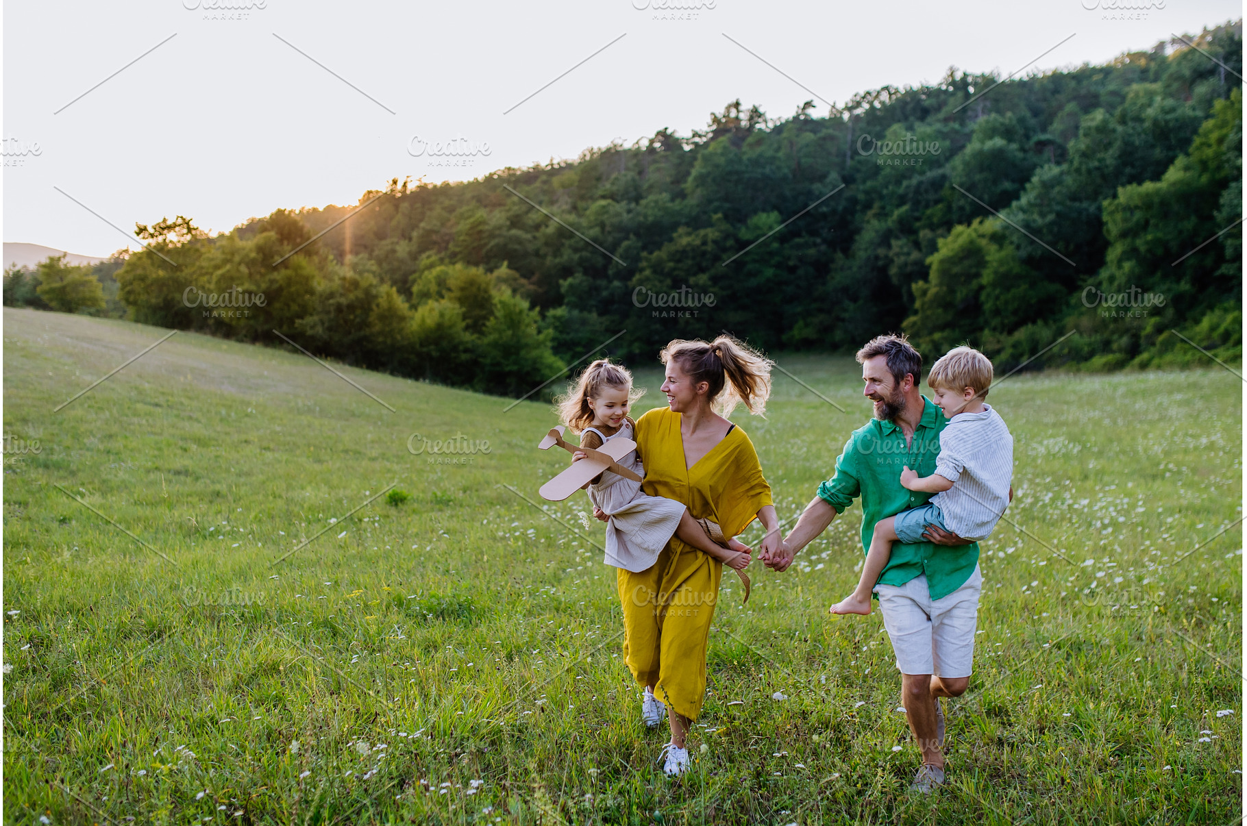 Happy young family spending time, a Person Photo by HalfPoint