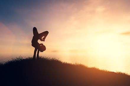Woman in yoga pose at sunset., a Health & Medical Photo by Photocreo Michal Bednarek