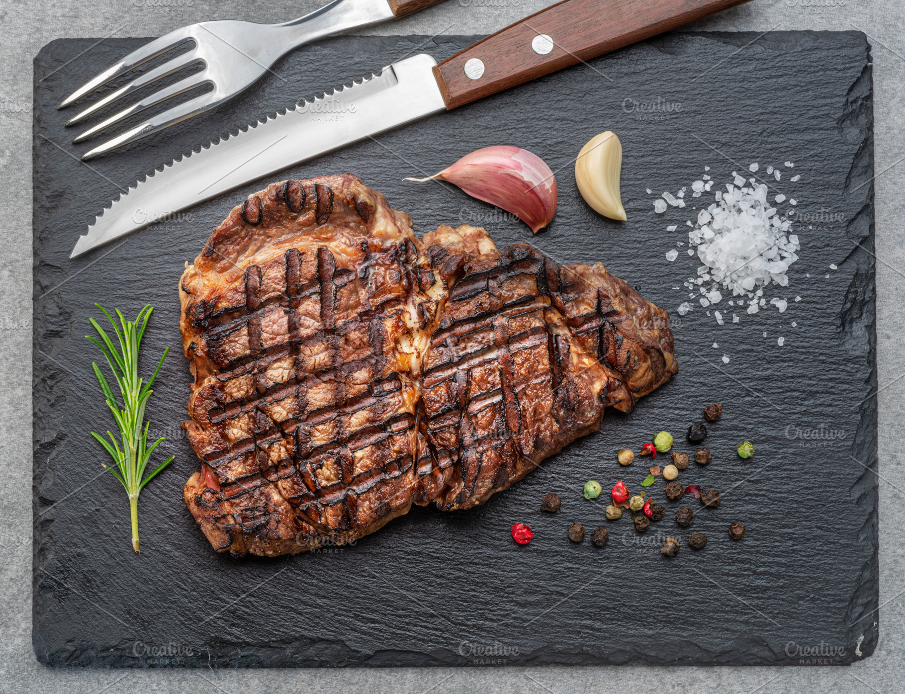 Grilled delicious ribeye steak, a Food & Drink Photo by Volff