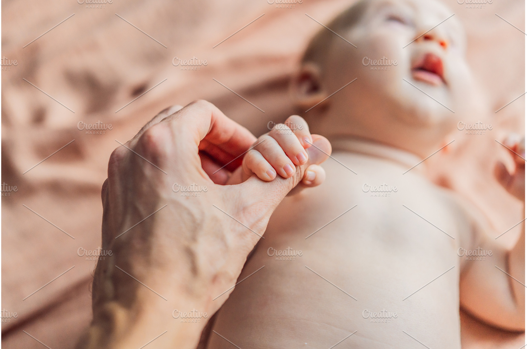 Loving father gently holds his, a Person Photo by Elizaveta Galitskaya