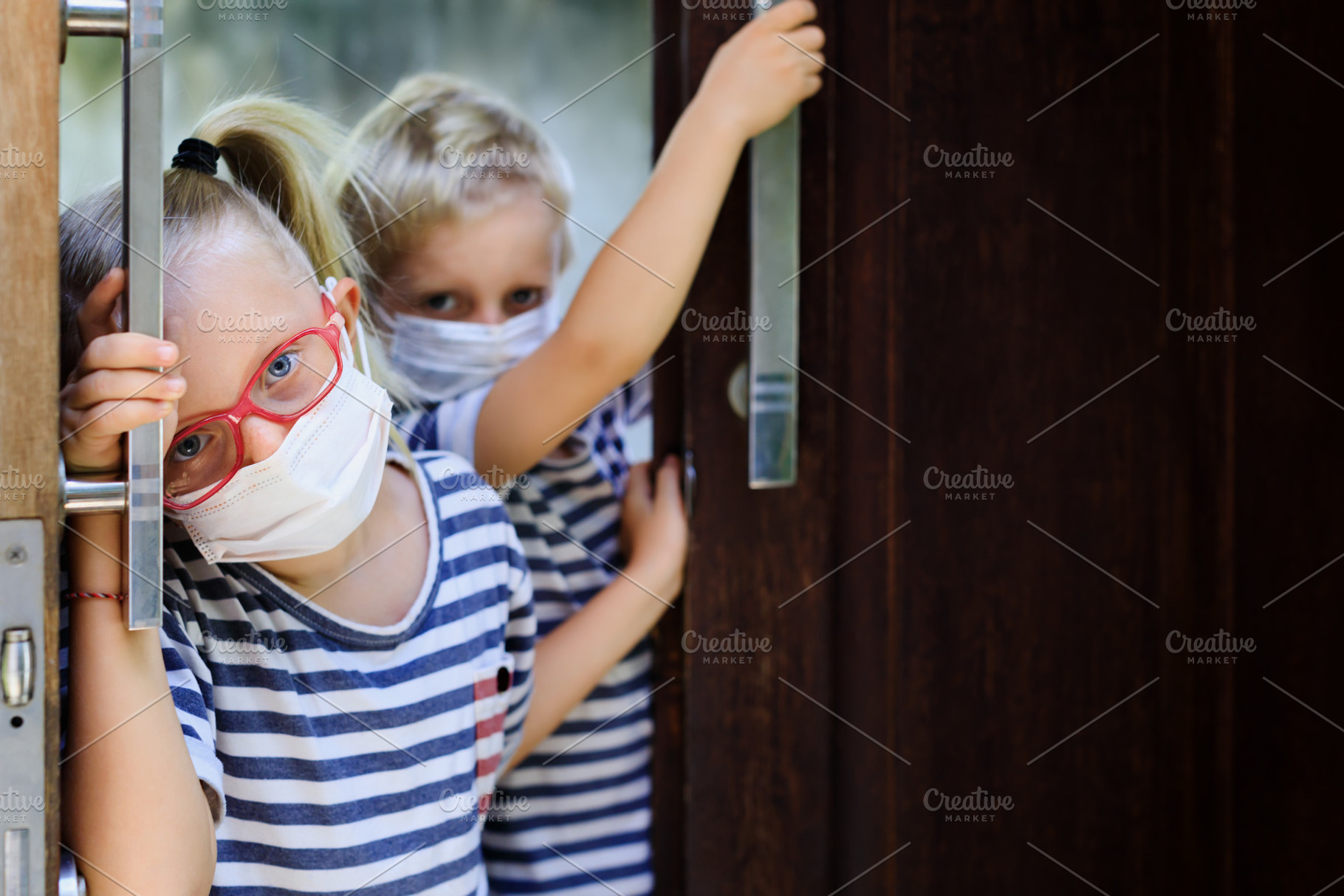 Sad kids wearing face masks featuring face, mask, and stay, a Health & Medical Photo by Tropical Studio