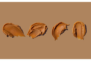 Smear of fresh peanut butter texture, a Food & Drink Photo by Yulia Furman