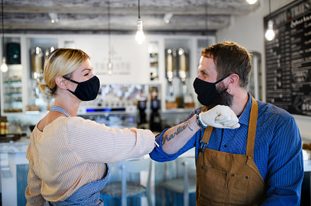 Coffee shop owners with face masks featuring concept, coronavirus, and corona, a Person Photo by HalfPoint
