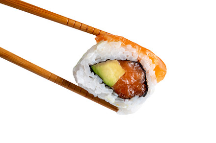 Sushi roll in chopsticks, a Food & Drink Photo by Miguel Guasch