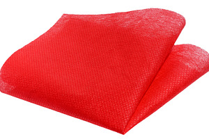 Folded red mesh fabric on isolated background, an Abstract Photo by ndanko