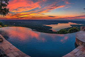 Sunset over serene infinity pool, a Photo by Beautiful things
