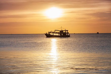 sunset in the ocean with glowing sky