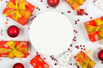 Red and gold christmas baubles, red gift boxes at white backgrou, a Holiday Photo by vimart