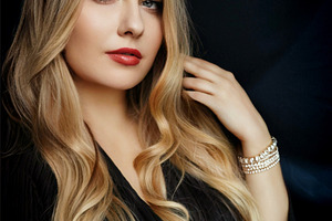 Blonde woman posing with elegant makeup and jewelry, representin, a Person Photo by Studio ANNA