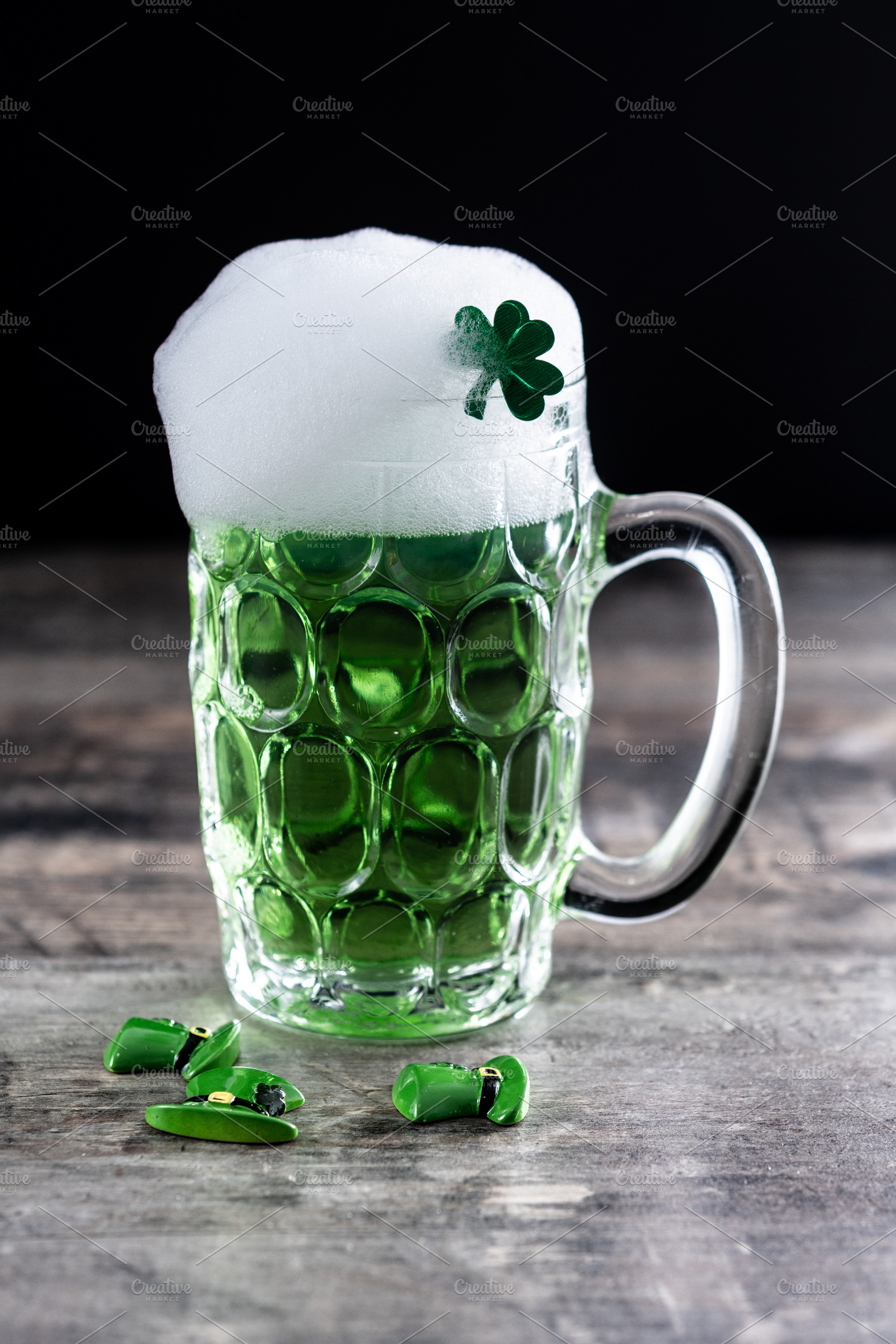 Green beer mug with foam for St. Patrick’s Day, a Food & Drink Photo by etorres69