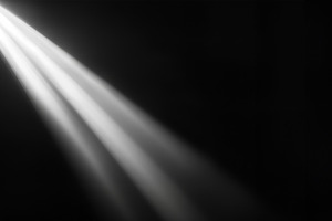 Diagonal light beam black background, a Photo by LiliGraphie