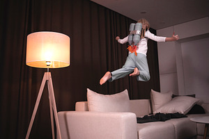 From sofa into open space containing girl, cute, and little