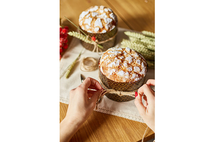 Woman hand preparing cake with, a Holiday Photo by IlliaBondarPhotography