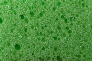 Detail of texture of synthetic green sponge with many holes, an Abstract Photo by Davizro's Market