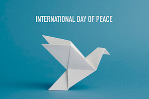 origami dove, global Day of Peace, generative AI, a Photo by Nito