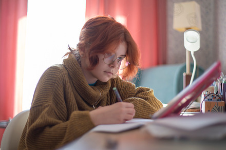 schoolgirl doing homework., a Photo by Pictures for you!!!!!!!!!
