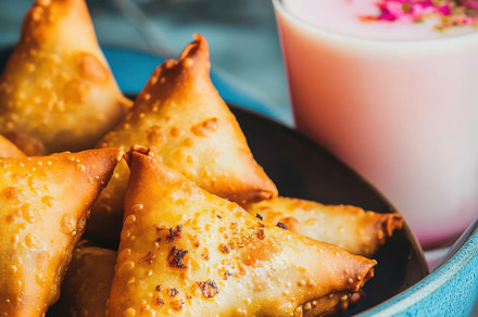 Crispy Indian Samosas with milk, a Food & Drink Photo by Virgo Studio