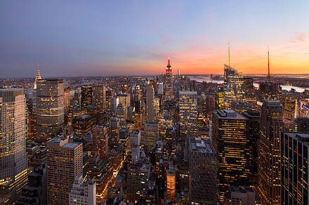 Sunset over new york city stock photo containing aerial and america, an Architecture Photo by inigocia