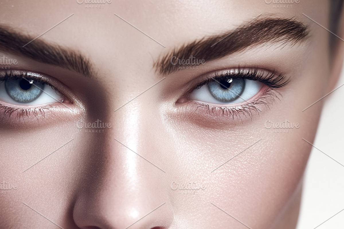 Woman's blue eyes with natural makeup on a clean face, showing b, a Beauty & Fashion Photo by Studio ANNA (Photo 1 of 2)