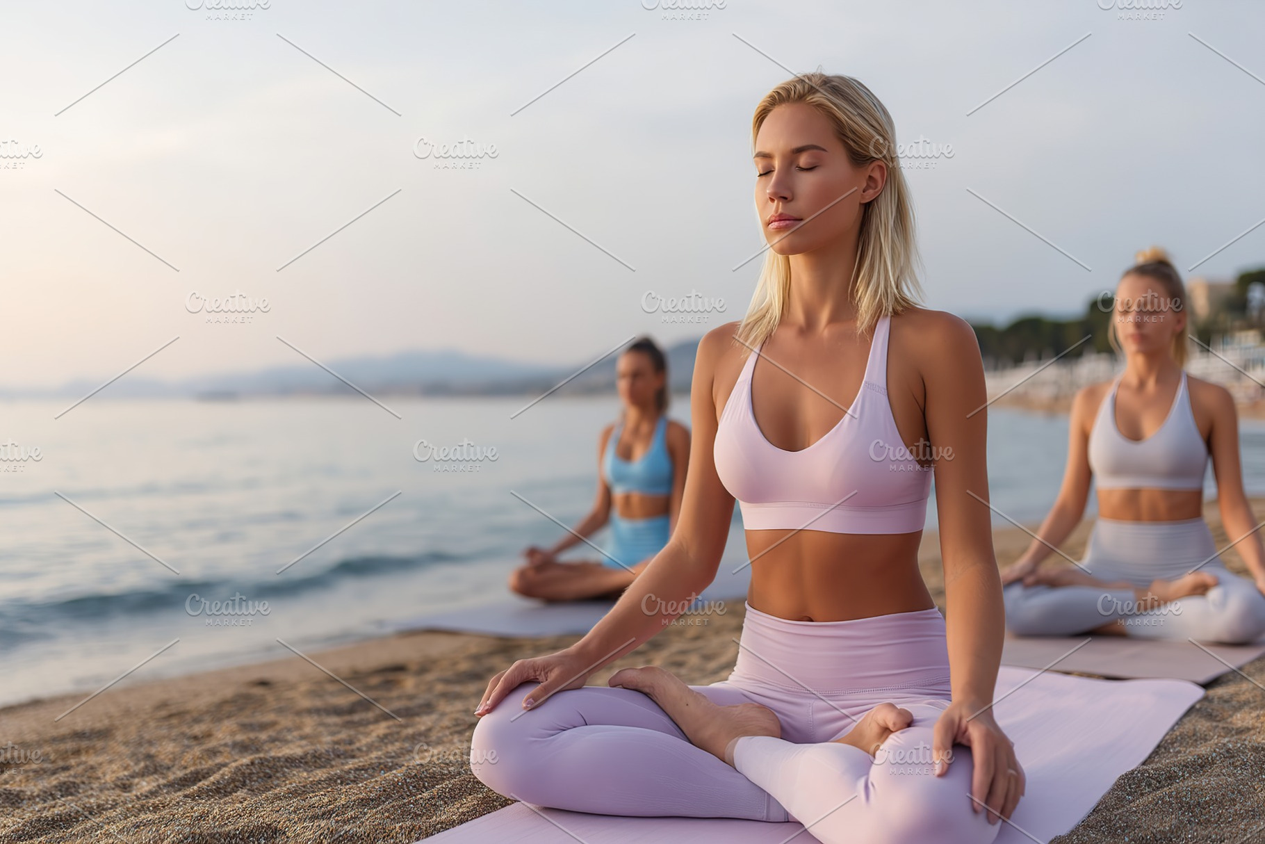 Beautiful women practicing yoga on mats by the beach during sunset, a Person Photo by AlyaAnd